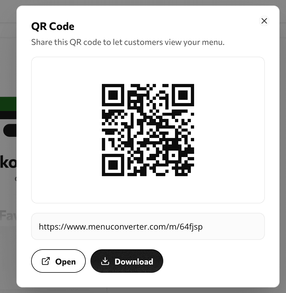 Staff updating menu items in the editor with live QR-preview in the background